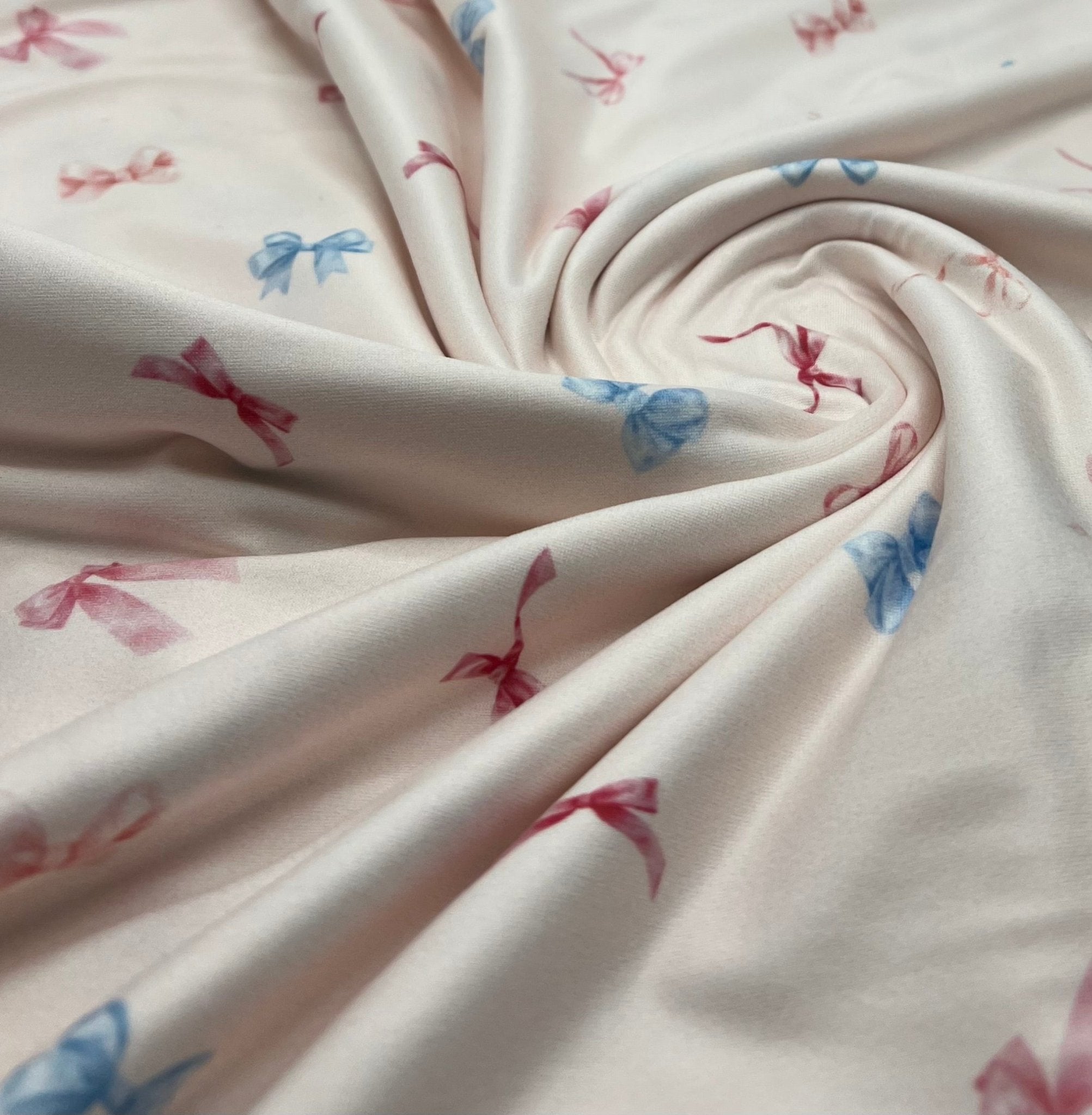 Soft Pink Multi Bows Super Soft Print Spun Poly Stretch Fabric - T9 Fabrics