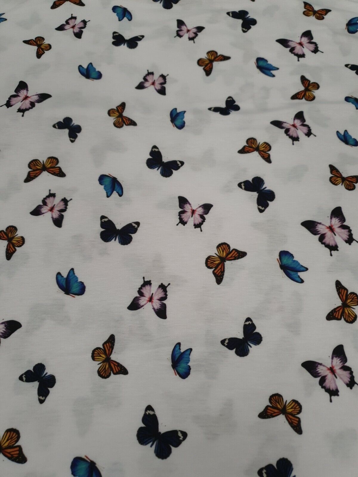 White Butterfly Print Spun Poly Stretch Fabric - T9 Fabrics